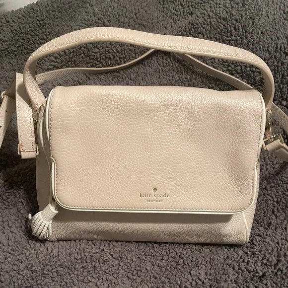 Cream colored Kate Spade purse